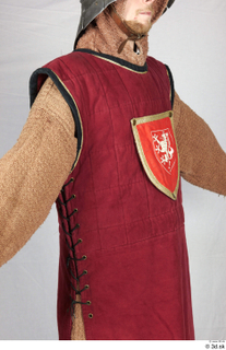 Photos Medieval Knight in cloth armor 5 Czech medieval soldier Medieval clothing brown gambeson red vest with czech emblem upper body 0010.jpg